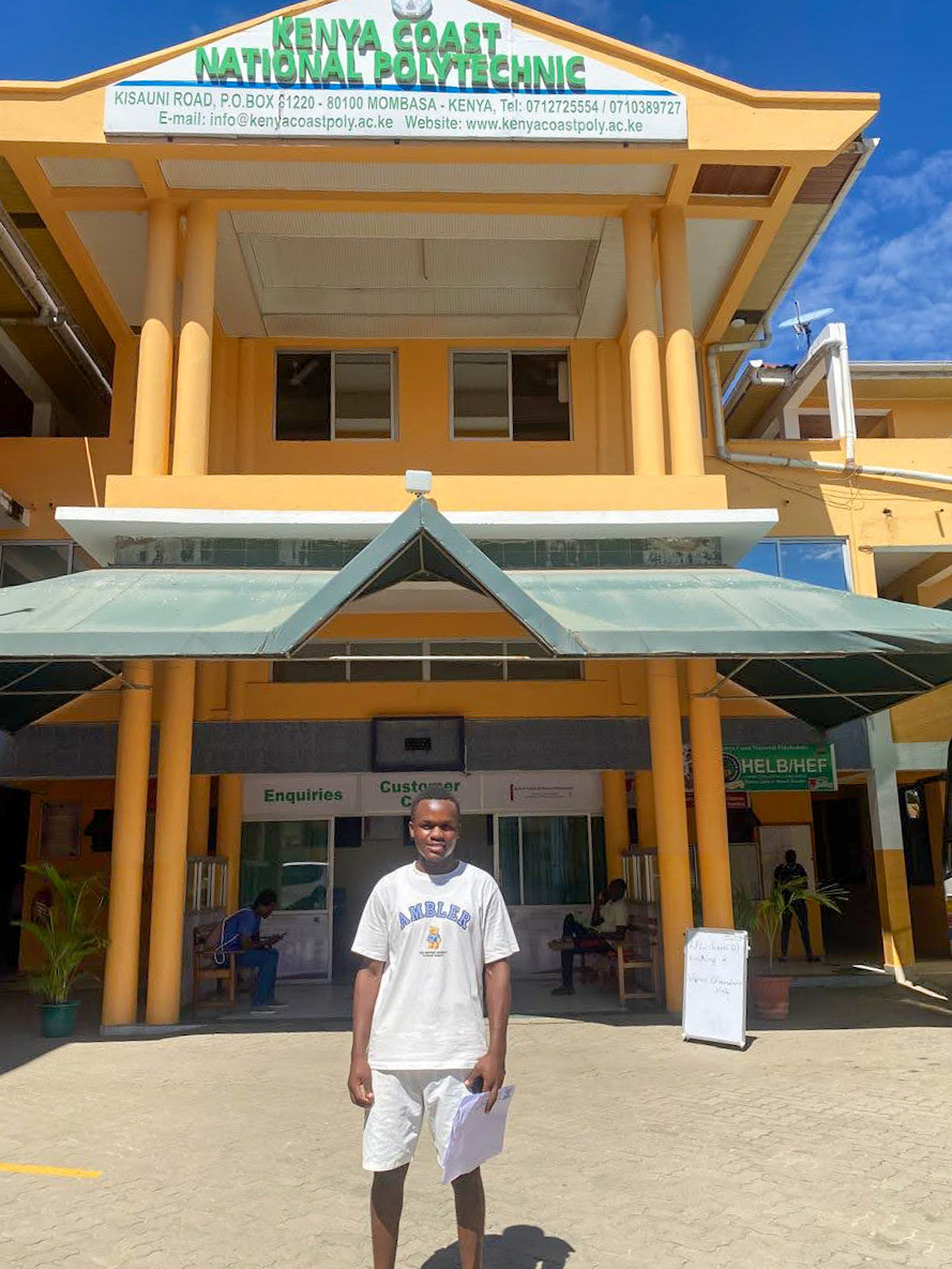student outside building