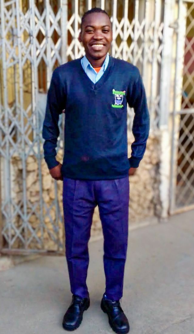 young man in school uniform