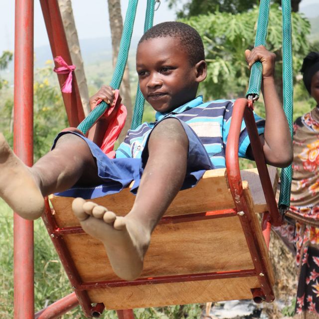 child on swing