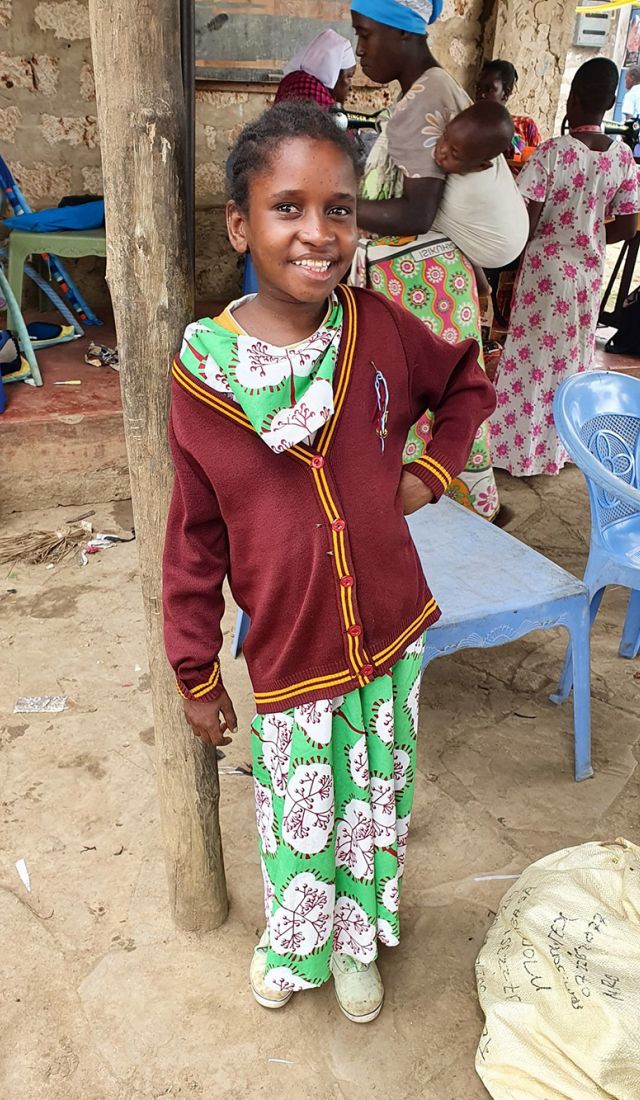 young girl in school uniform