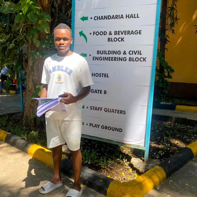 student waiting outside